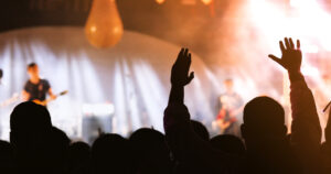 silhouettes-concert-crowd-rear-view-festival-crowd-raising-their-hands.jpg  