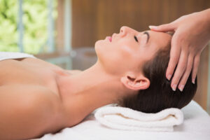 attractive-woman-receiving-head-massage-spa-center.jpg  