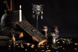 books-with-spells-old-pot-jars-potion-are-wooden-dark-table-petals-dried-roses-are-scatte.jpg.jpg  